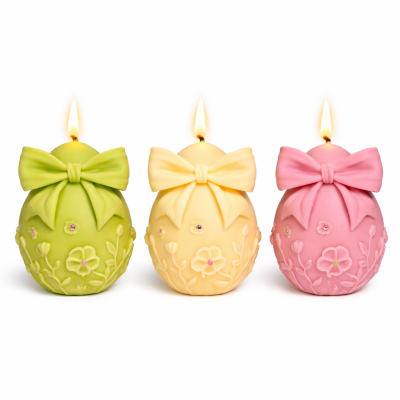 Uskršnje jaje s mašnom Sandéa - 1 - SANDEA Uskršnje jaje s mašnom dekorativna je svijeća izrađena od voska uljane repice koja u